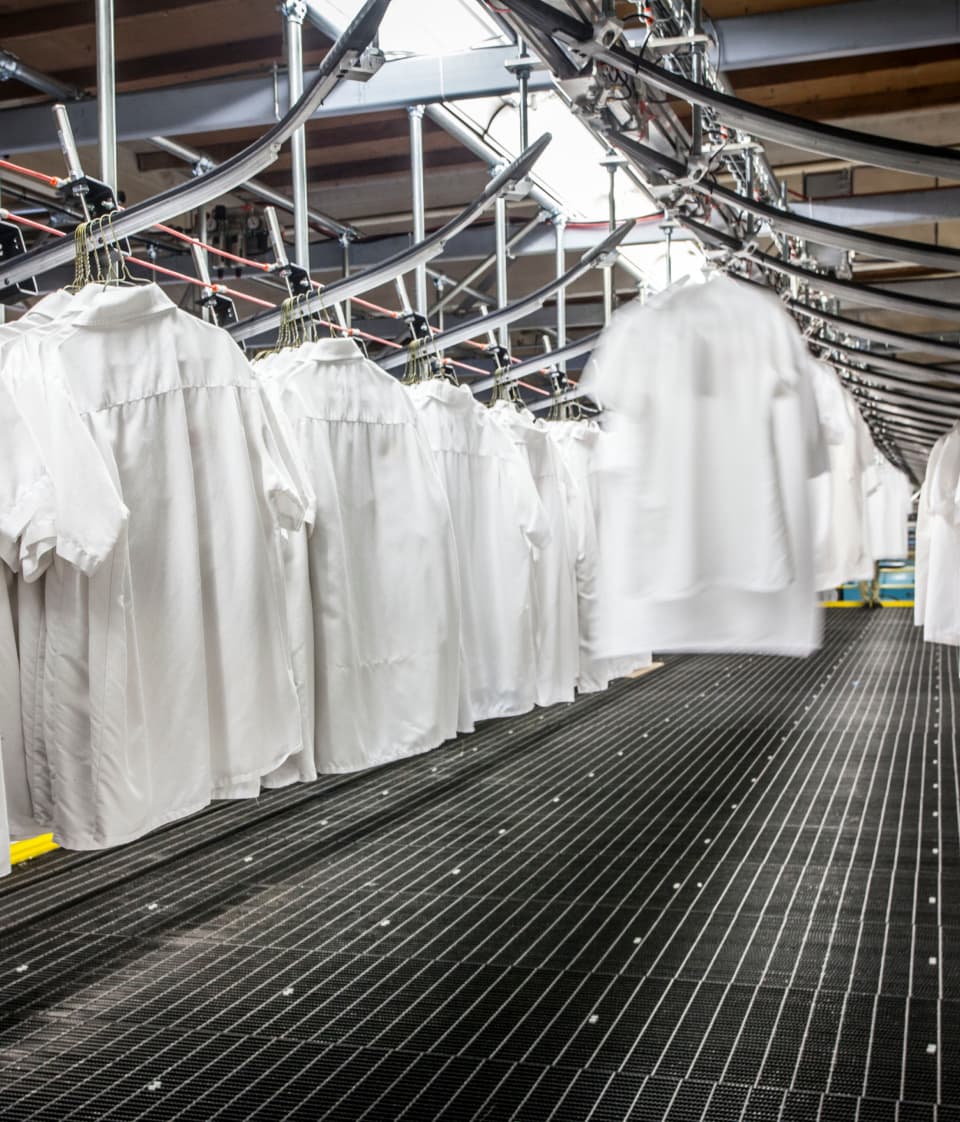 Garments being sorted on rails