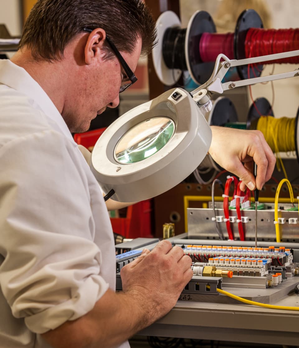 A man working on electronics